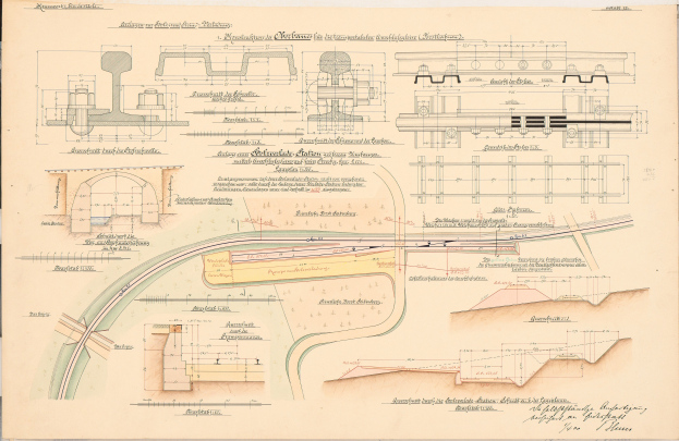 Altes Buch mit detaillierten Zeichnungen und Text eines Bahngeleiseplans auf seinen Seiten.