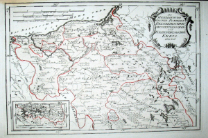 Alte Deutschlandkarte mit roter Linie darauf, auf Papier gedruckt mit handgeschriebener Text.