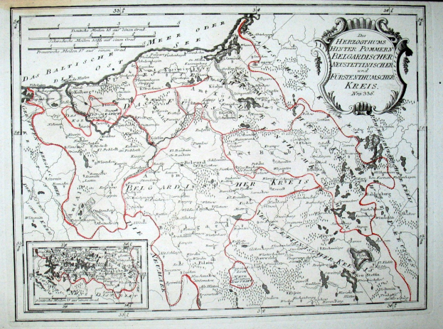 Alte Deutschlandkarte mit roter Linie darauf, auf Papier gedruckt mit handgeschriebener Text.